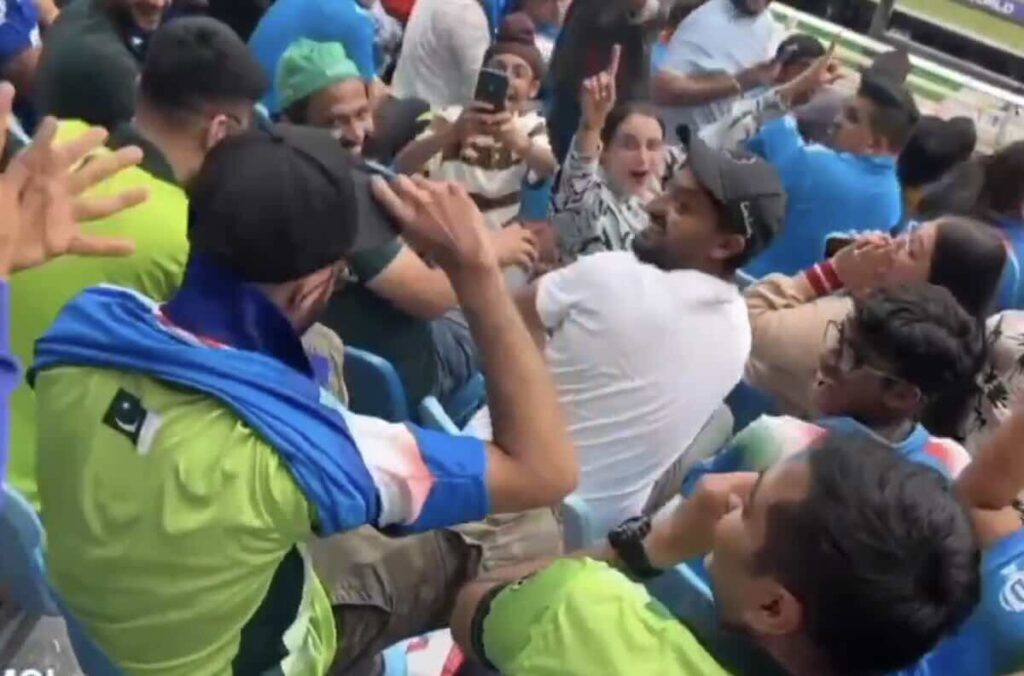 Pakistani fan wears Indian jersey during India vs Pakistan champions trophy (2025) match in Dubai.